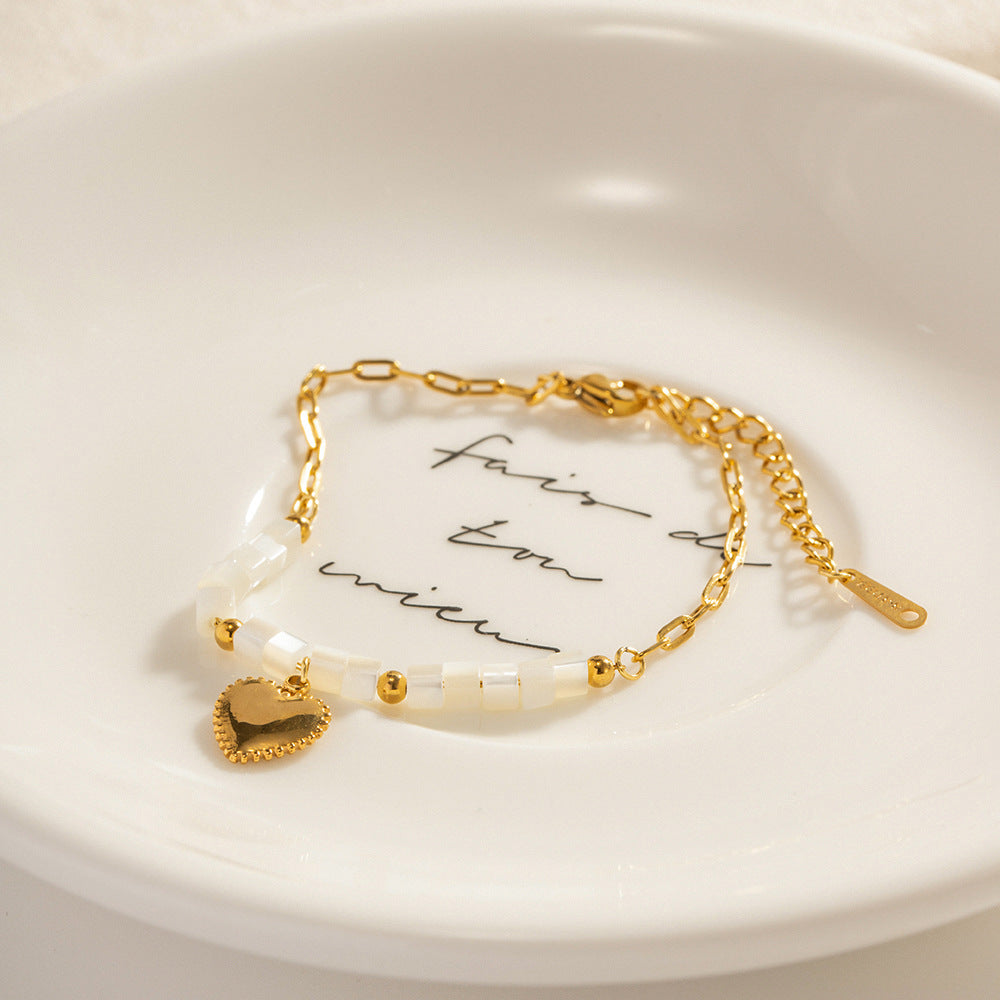 Bracelet &quot;cuore&quot; plaqué or 18 carat et perles de nacre